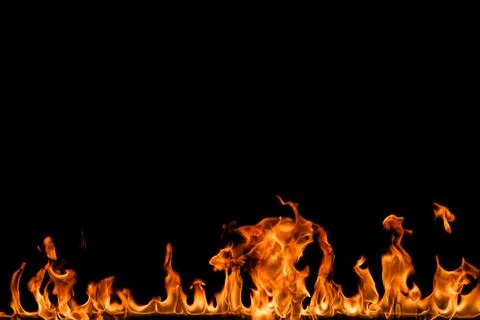 Fire flames on black background. Stock Photos