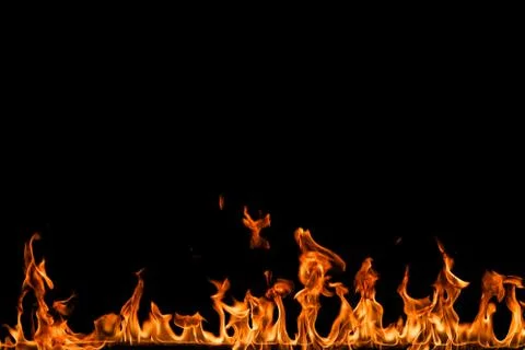 Fire flames on black background. Stock Photos