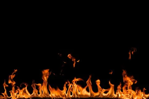 Fire flames on black background. Stock Photos