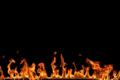 Fire flames on black background. Stock Photos