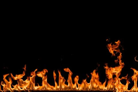 Fire flames on black background. Stock Photos