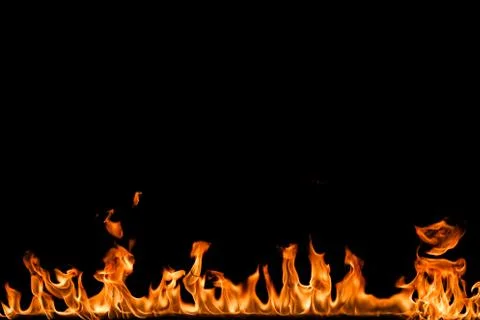 Fire flames on black background. Stock Photos