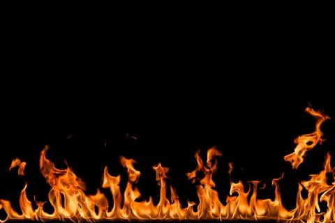 Fire flames on black background. Stock Photos