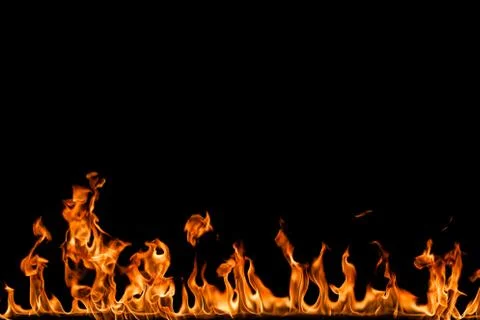 Fire flames on black background. Stock Photos