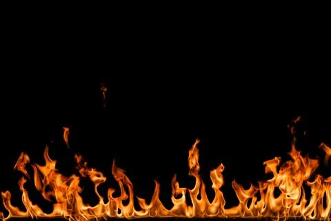 Fire flames on black background. Stock Photos
