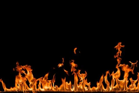Fire flames on black background. Stock Photos