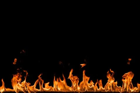 Fire flames on black background. Stock Photos