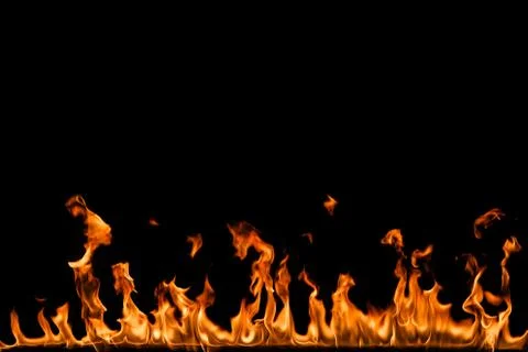 Fire flames on black background. Stock Photos