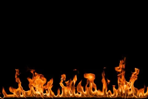 Fire flames on black background. Stock Photos