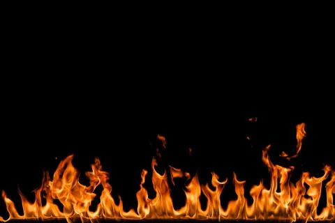 Fire flames on black background. Stock Photos