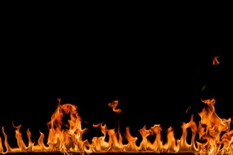 Fire flames on black background. Stock Photos