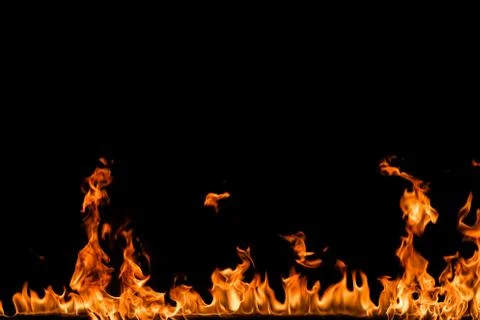 Fire flames on black background. Stock Photos