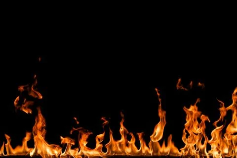 Fire flames on black background. Stock Photos