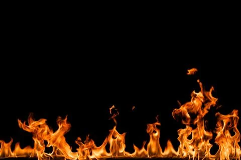 Fire flames on black background. Stock Photos