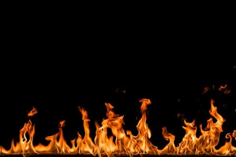 Fire flames on black background. Stock Photos