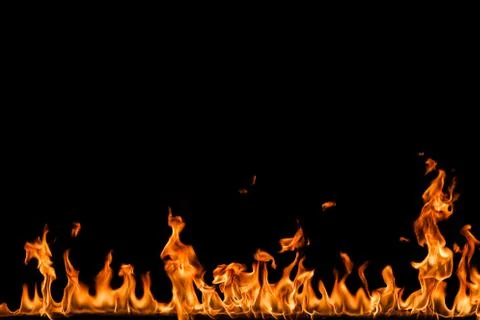 Fire flames on black background. Stock Photos