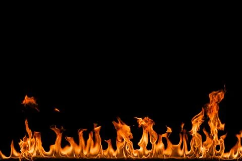 Fire flames on black background. Stock Photos