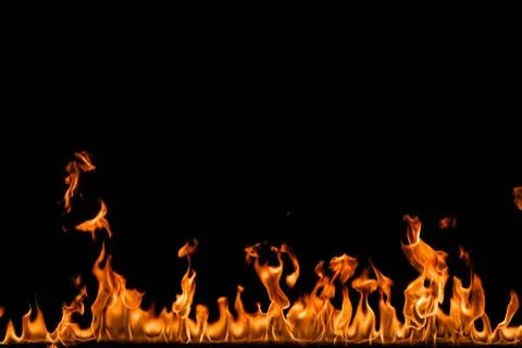 Fire flames on black background. Stock Photos