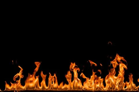 Fire flames on black background. Stock Photos