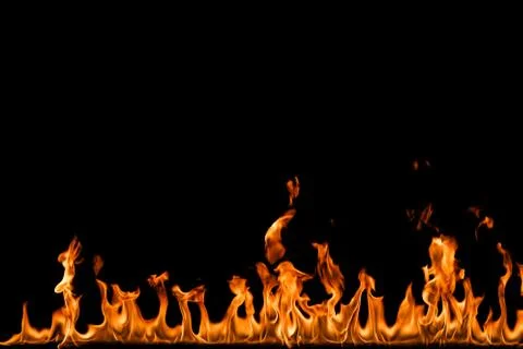 Fire flames on black background. Stock Photos