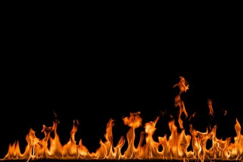 Fire flames on black background. Stock Photos