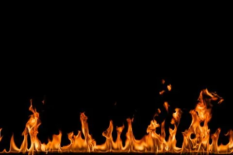 Fire flames on black background. Stock Photos