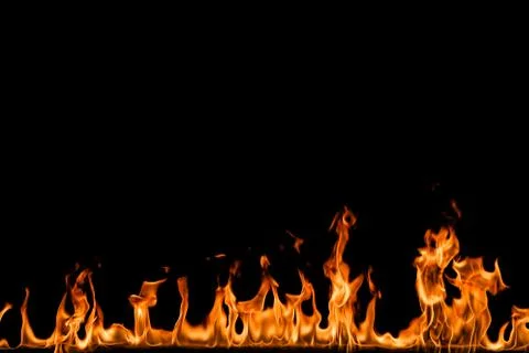 Fire flames on black background. Stock Photos
