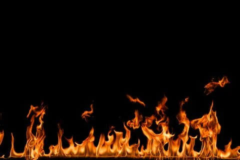 Fire flames on black background. Stock Photos