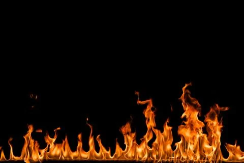 Fire flames on black background. Stock Photos