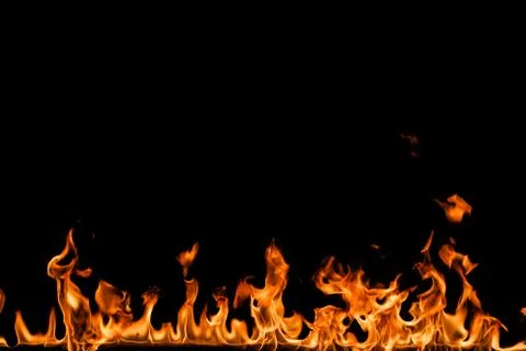 Fire flames on black background. Stock Photos