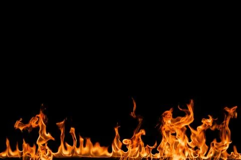 Fire flames on black background. Stock Photos