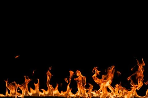 Fire flames on black background. Stock Photos