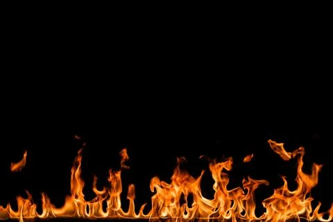 Fire flames on black background. Stock Photos