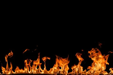 Fire flames on black background. Stock Photos