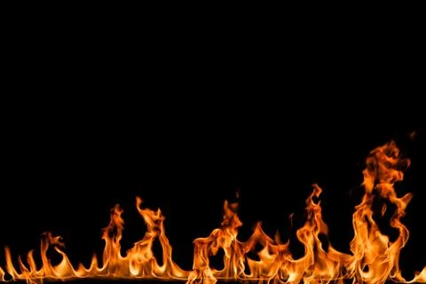Fire flames on black background. Stock Photos