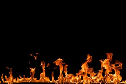 Fire flames on black background. Stock Photos