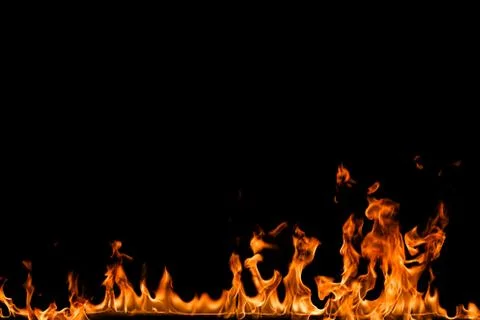 Fire flames on black background. Stock Photos