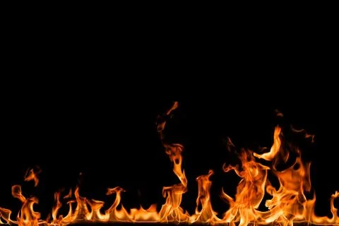 Fire flames on black background. Stock Photos