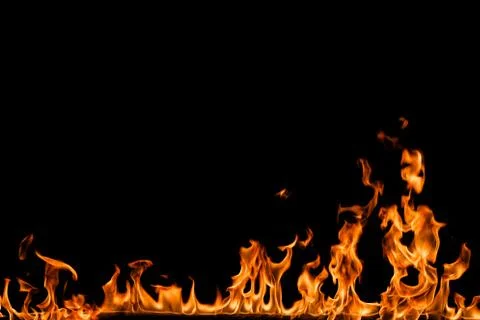 Fire flames on black background. Stock Photos