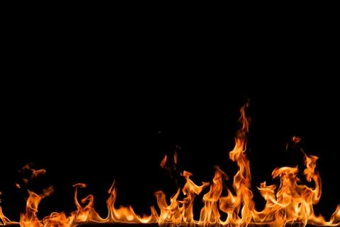 Fire flames on black background. Stock Photos