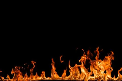 Fire flames on black background. Stock Photos