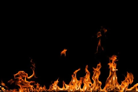 Fire flames on black background. Stock Photos