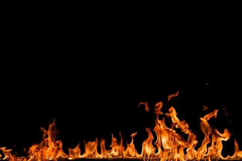 Fire flames on black background. Stock Photos