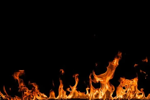 Fire flames on black background. Stock Photos