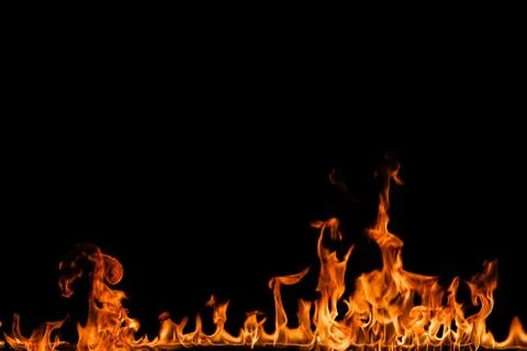Fire flames on black background. Stock Photos