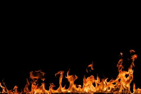 Fire flames on black background. Stock Photos