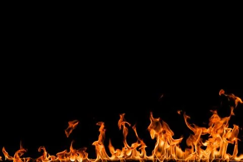 Fire flames on black background. Stock Photos