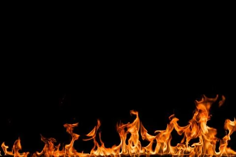 Fire flames on black background. Stock Photos