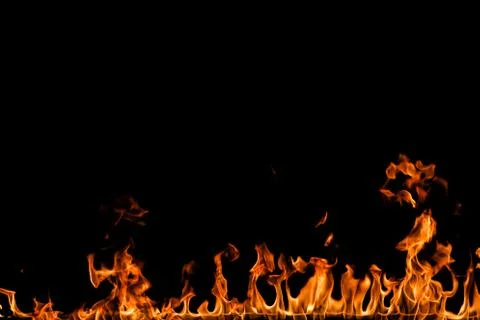 Fire flames on black background. Stock Photos
