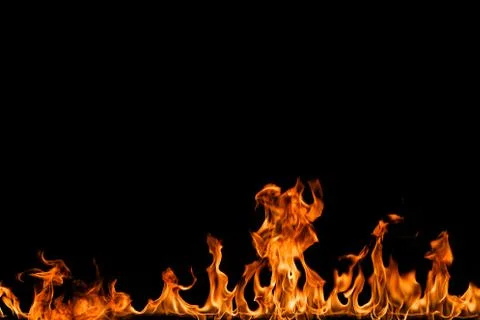 Fire flames on black background. Stock Photos